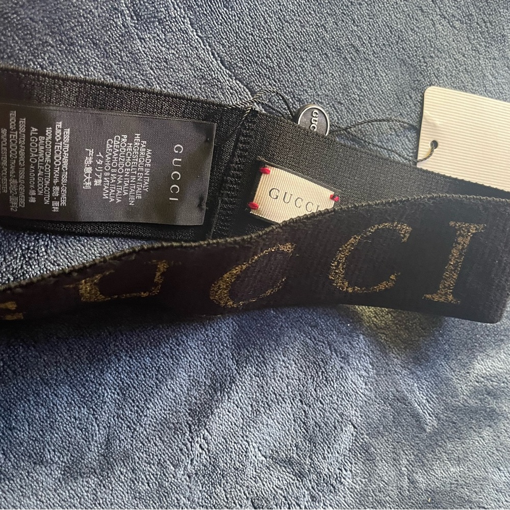 Black and gold Gucci headband